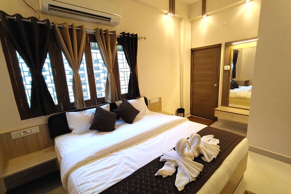 Glow Inn | Near Namo Ghat