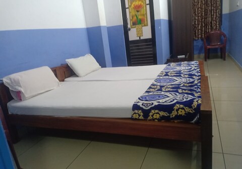 Amana Tourist Home