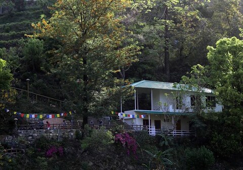 Sadhana Forest Villa | Nestled in the hills