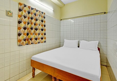 Hotel O Dream Palace Guest House Near Marina Beach