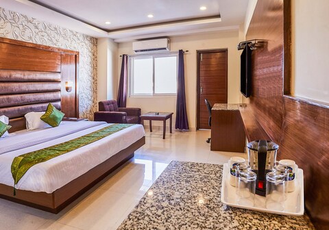 Treebo Grand Legacy Elite With Roof Top Cafe