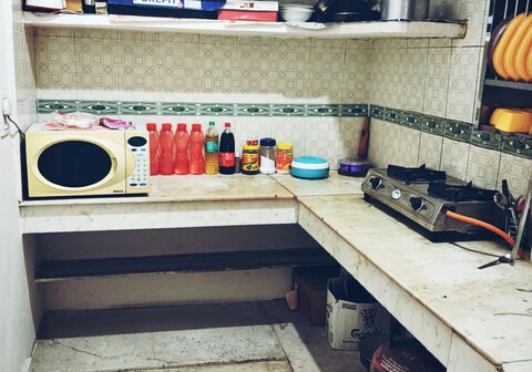 Peaceful 2BHK Stay with Equipped Kitchen