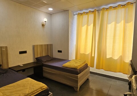 Abuzz Oxfordcaps Imperial Heights Dehradun