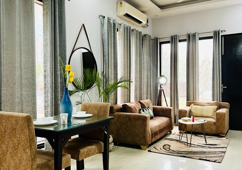 Entire 1BHK Apartment by Bluo at DLF Galleria Market