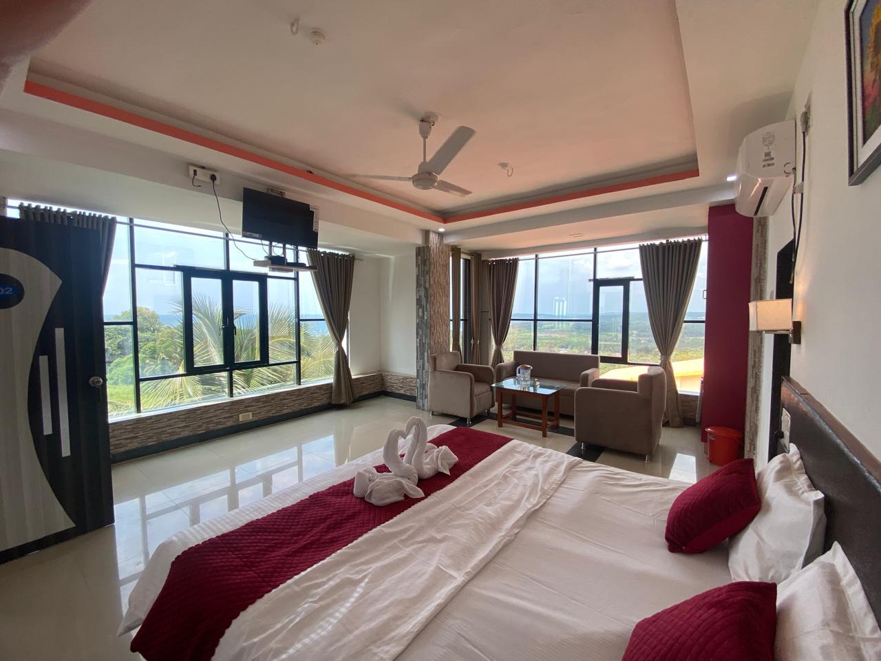 DELUXE KRISHNA SEA VIEW - Tap to explore photos