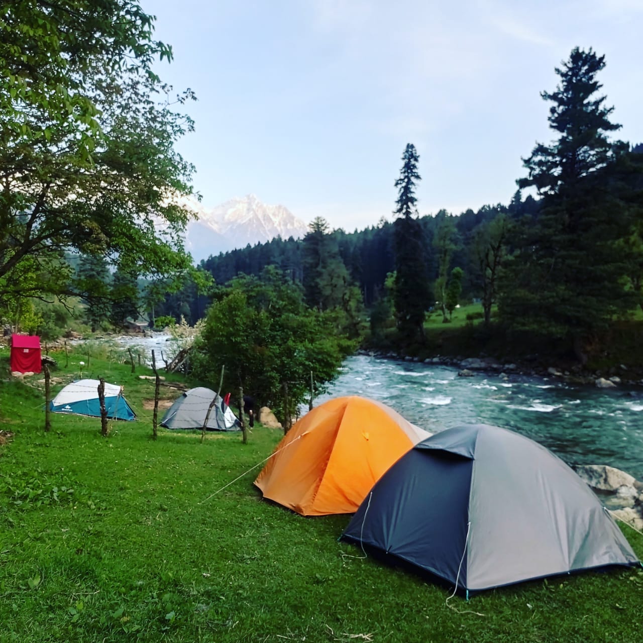 River view camping - Tap to explore photos