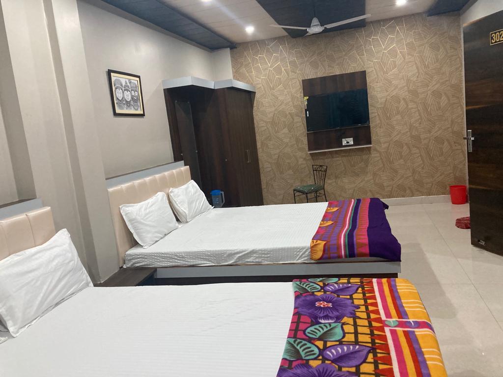 Rudraksha Guest House - Tap to explore photos