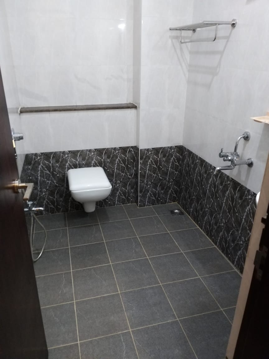Dhanaram A/C Rooms - Tap to explore photos