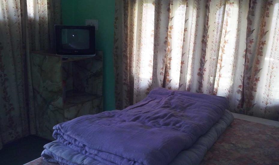 Baba Balak Nath Guest House (Room for 4) - Tap to explore photos