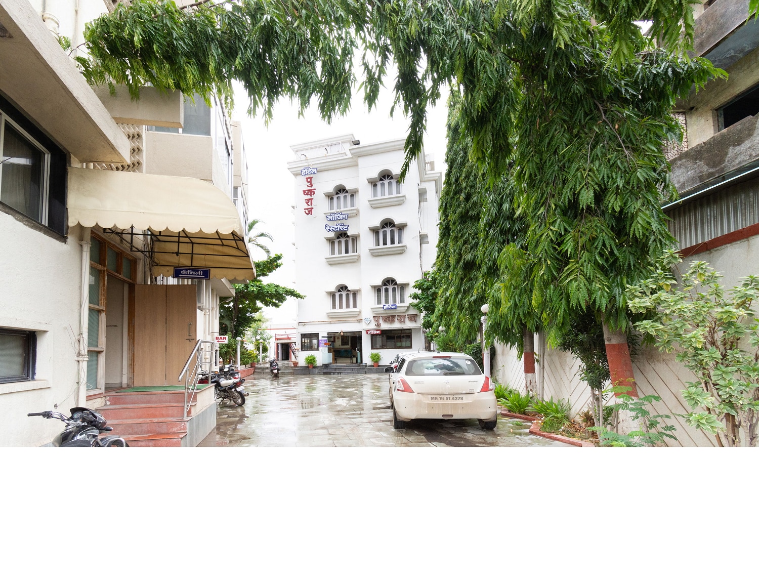 Hotel Pushkaraj - Tap to explore photos