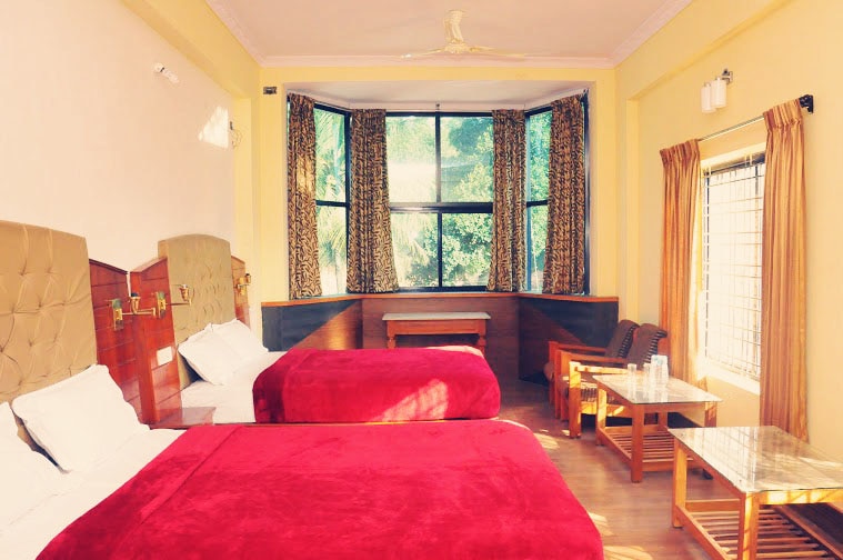 Hotel Durga International - Tap to explore photos