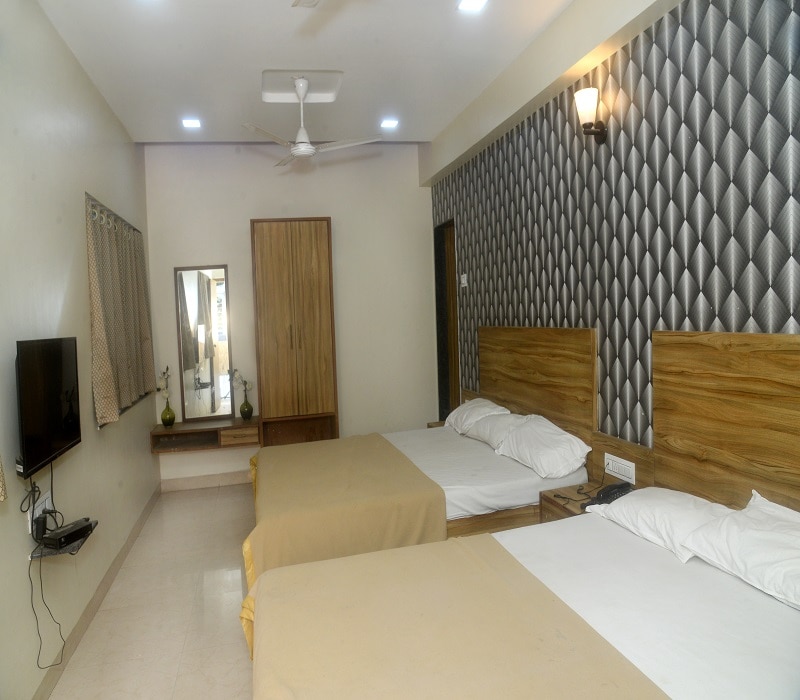 Hotel Radhika - Tap to explore photos