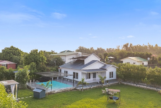 Alaya Stays Nathaniel | 3 BHK Pet friendly Farmhouse with Pool & Garden