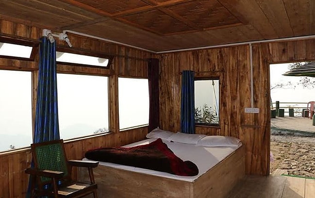 Jhandi Eco Huts - Tap to explore photos