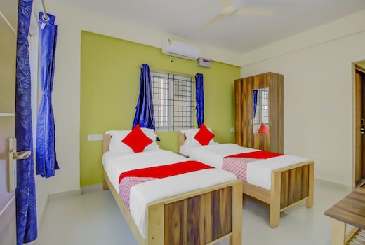 Hotel O Nelli Suites