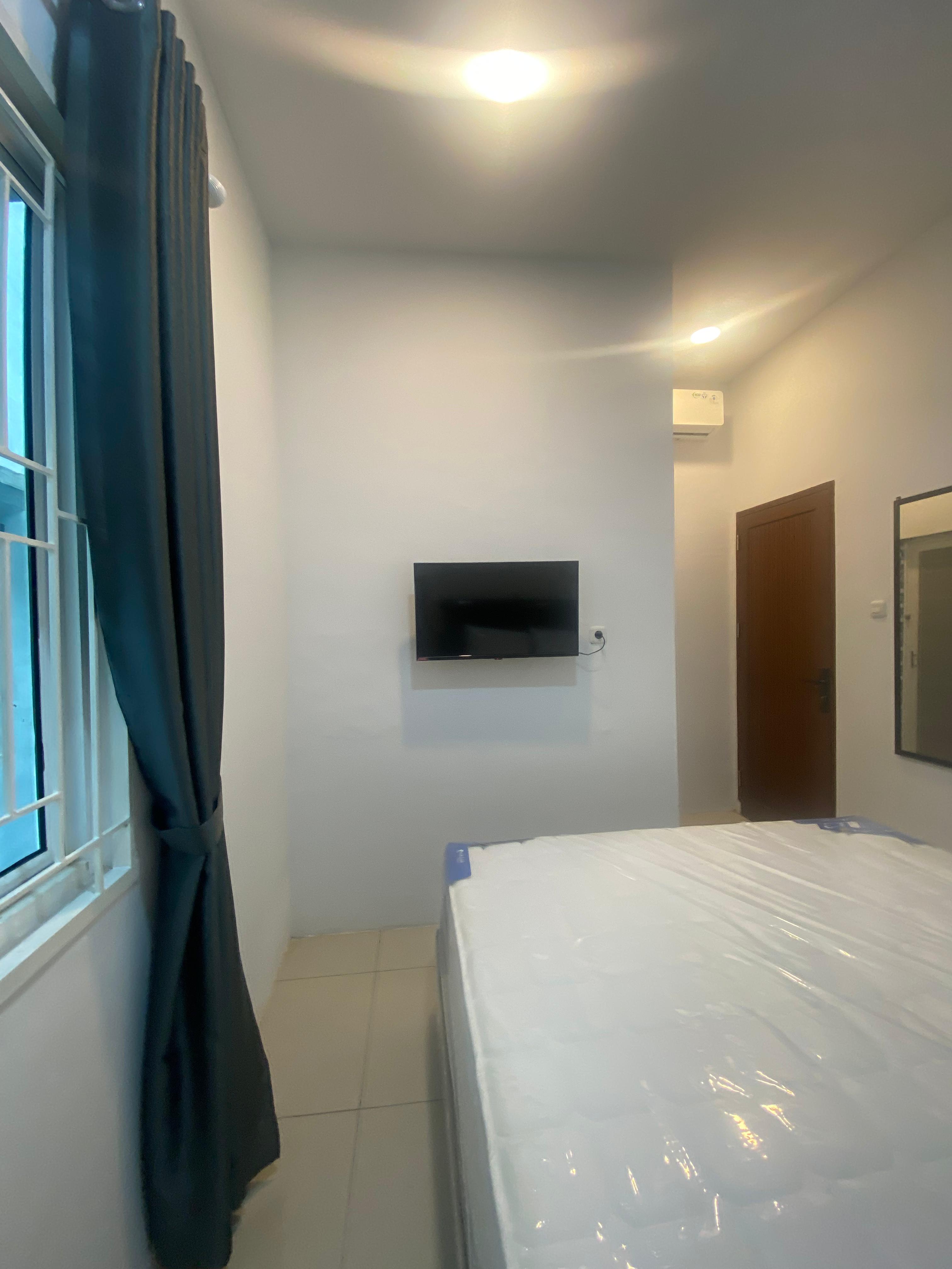 Collection O Almasarra Residence Near Ring Road Medan - Tap to explore photos