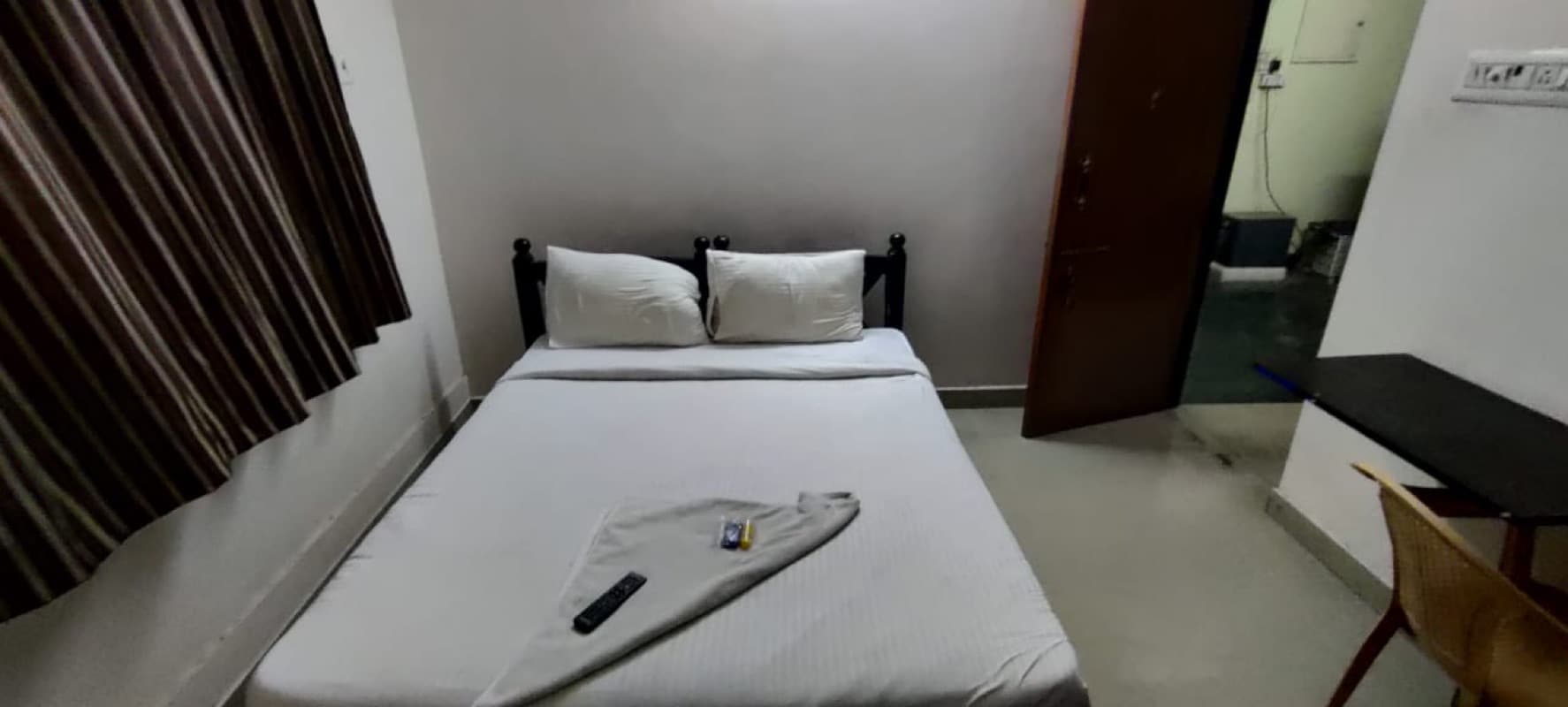 SPOT ON The Grand Guest House Near PVR Cinemas Skywalk - Tap to explore photos