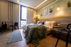 Cozy Studio by Miraki   Netflix   Lavish Bath, Gurgaon