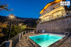 StayVista at Sunset Springs w/ Heated Swimming Pool, Kosya Kutauli