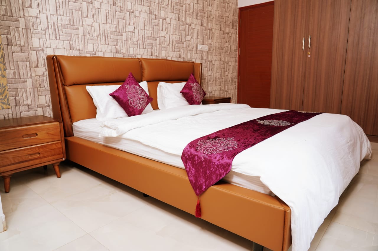 Unnathi Suites - Tap to explore photos