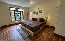 Double bed room shared balcony