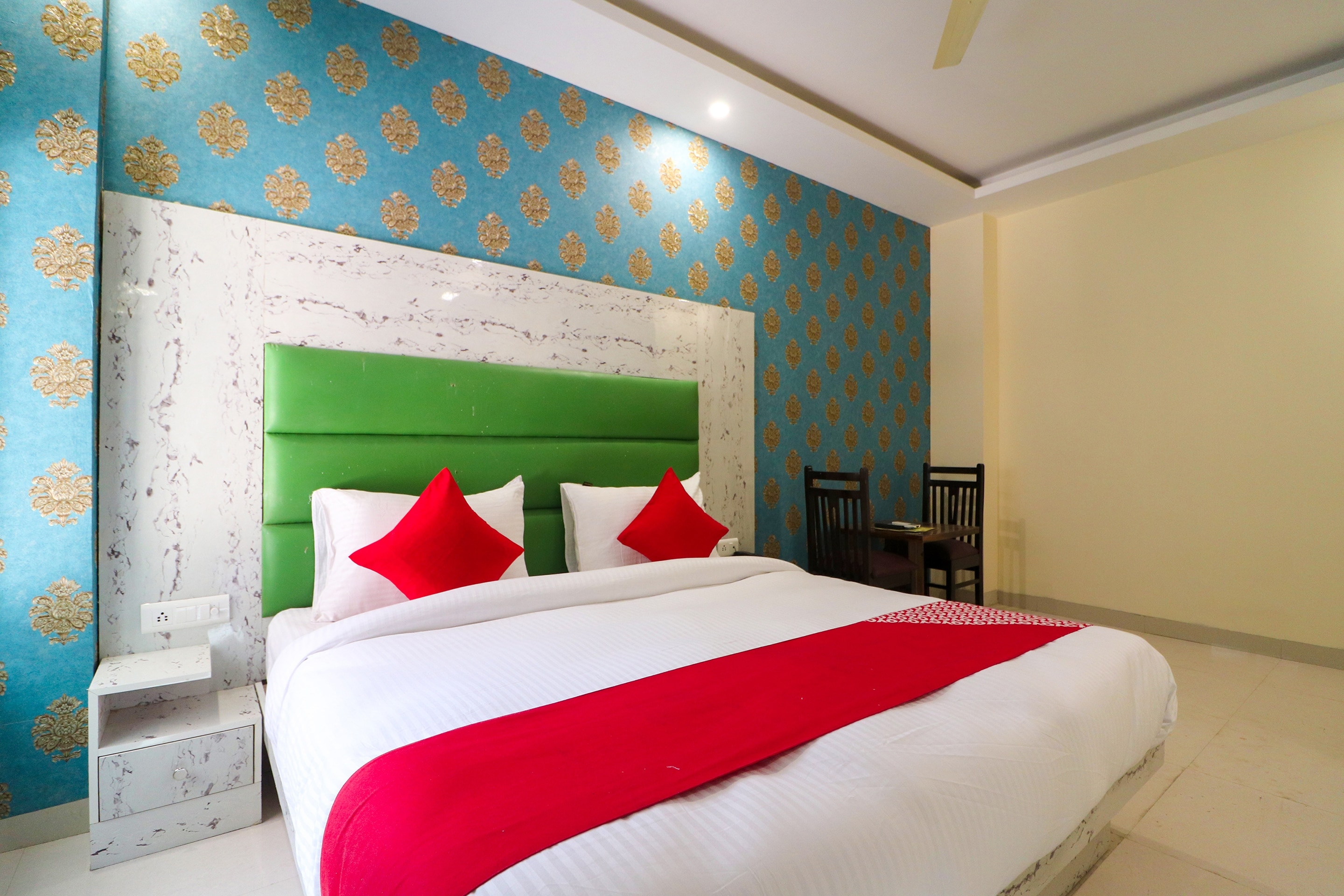 Hotel O Smart City - Tap to explore photos