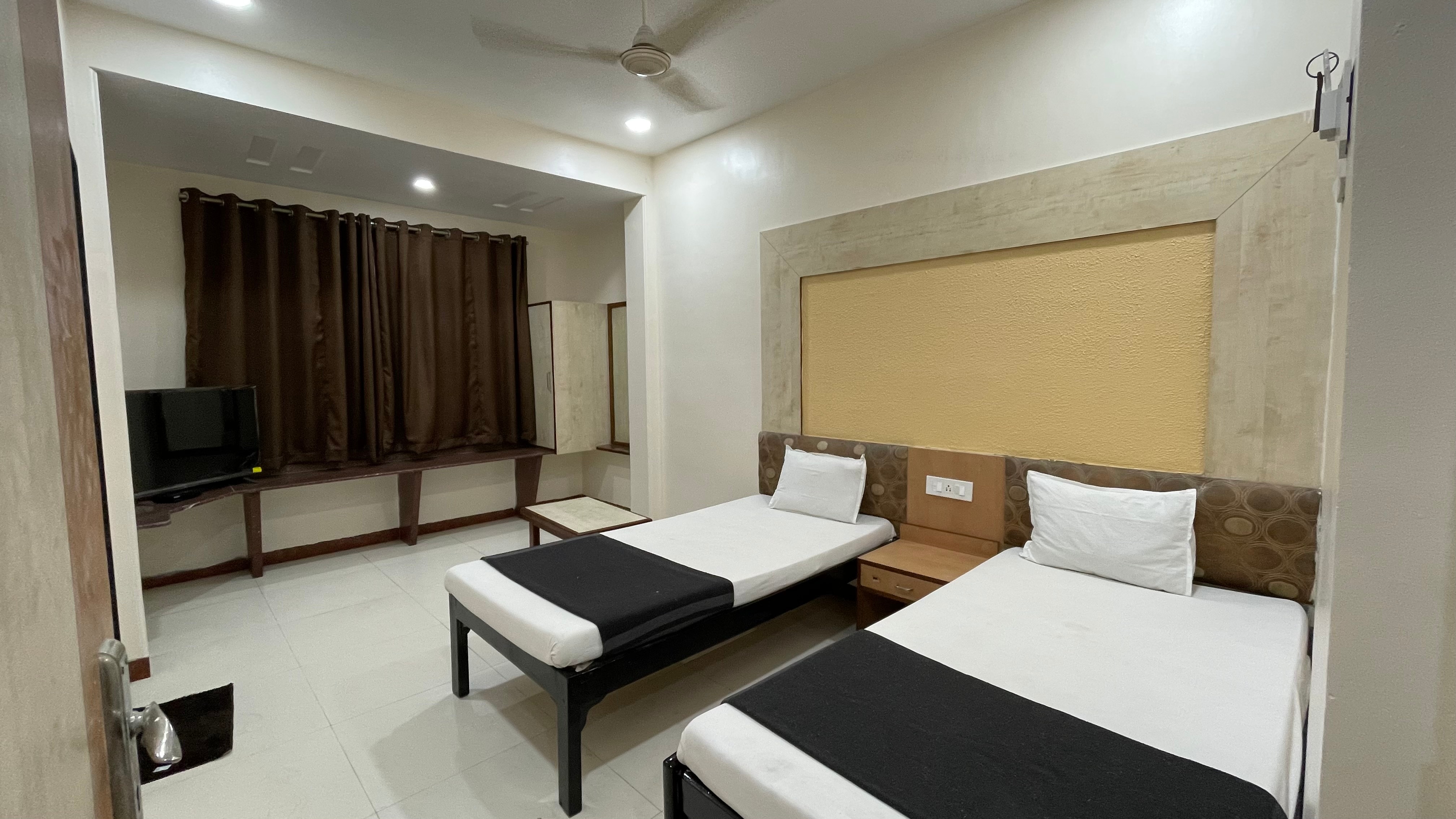 Hotel Rajdhani - Tap to explore photos