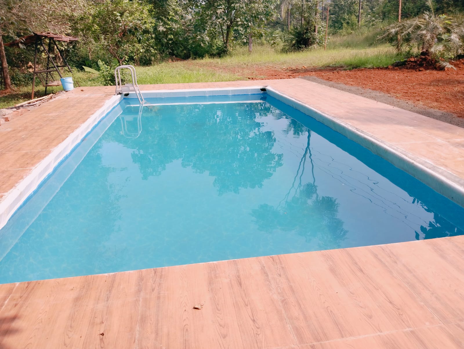 Savli Farm's AC Premium Rooms - Tap to explore photos