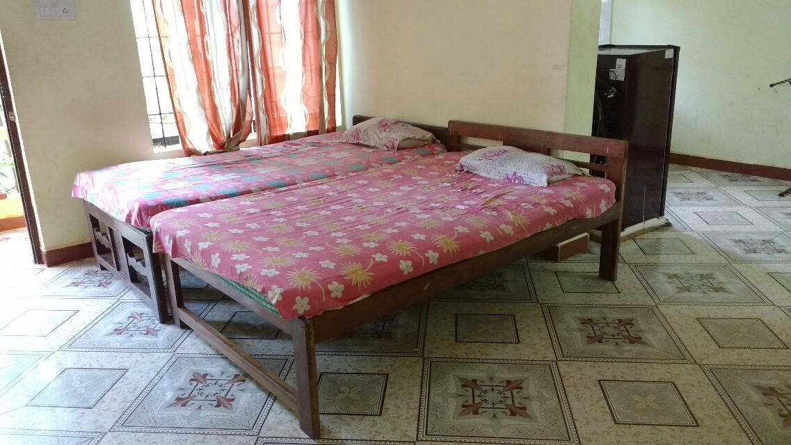 Shree Ganesh Guesthouse Rooms - Tap to explore photos