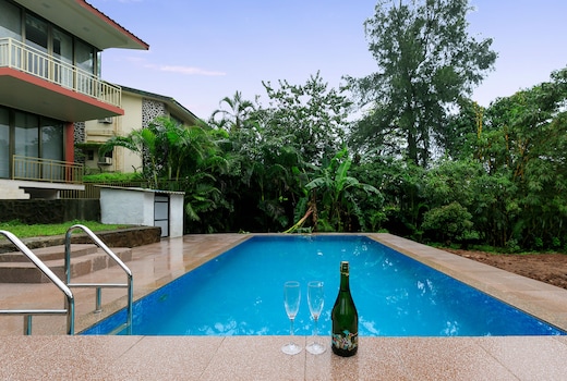StayVista at Pura Vida - A hill-view villa with Modern interiors & Swimming pool