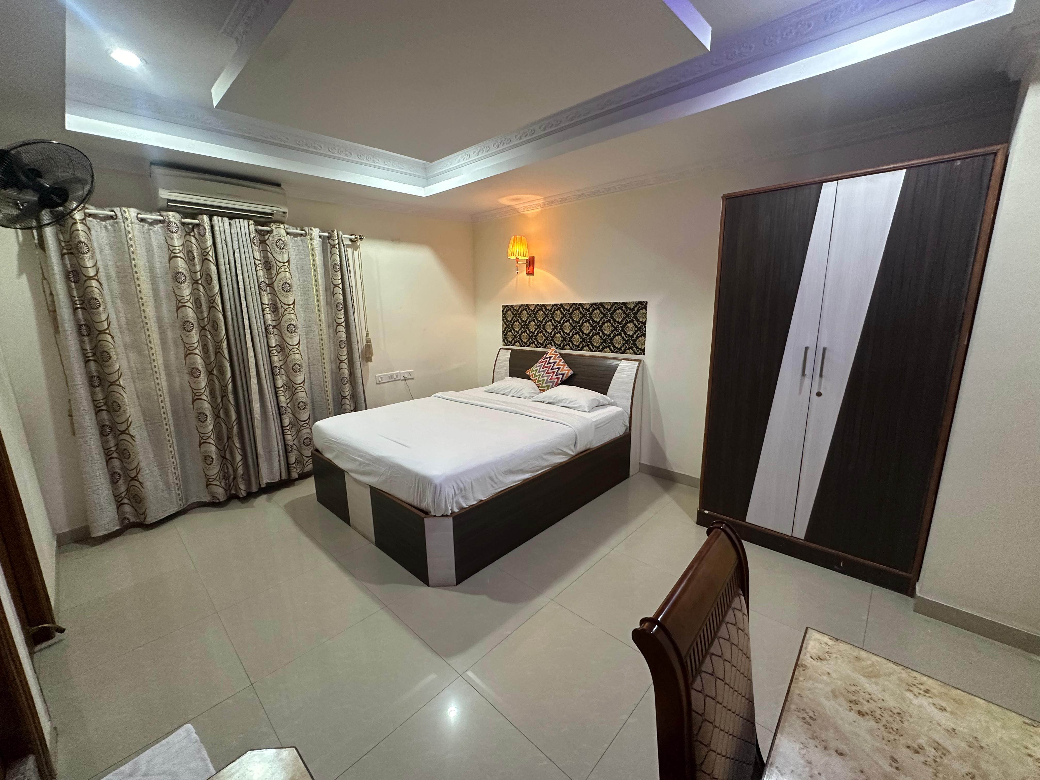 tanour luxe service apartment - Tap to explore photos