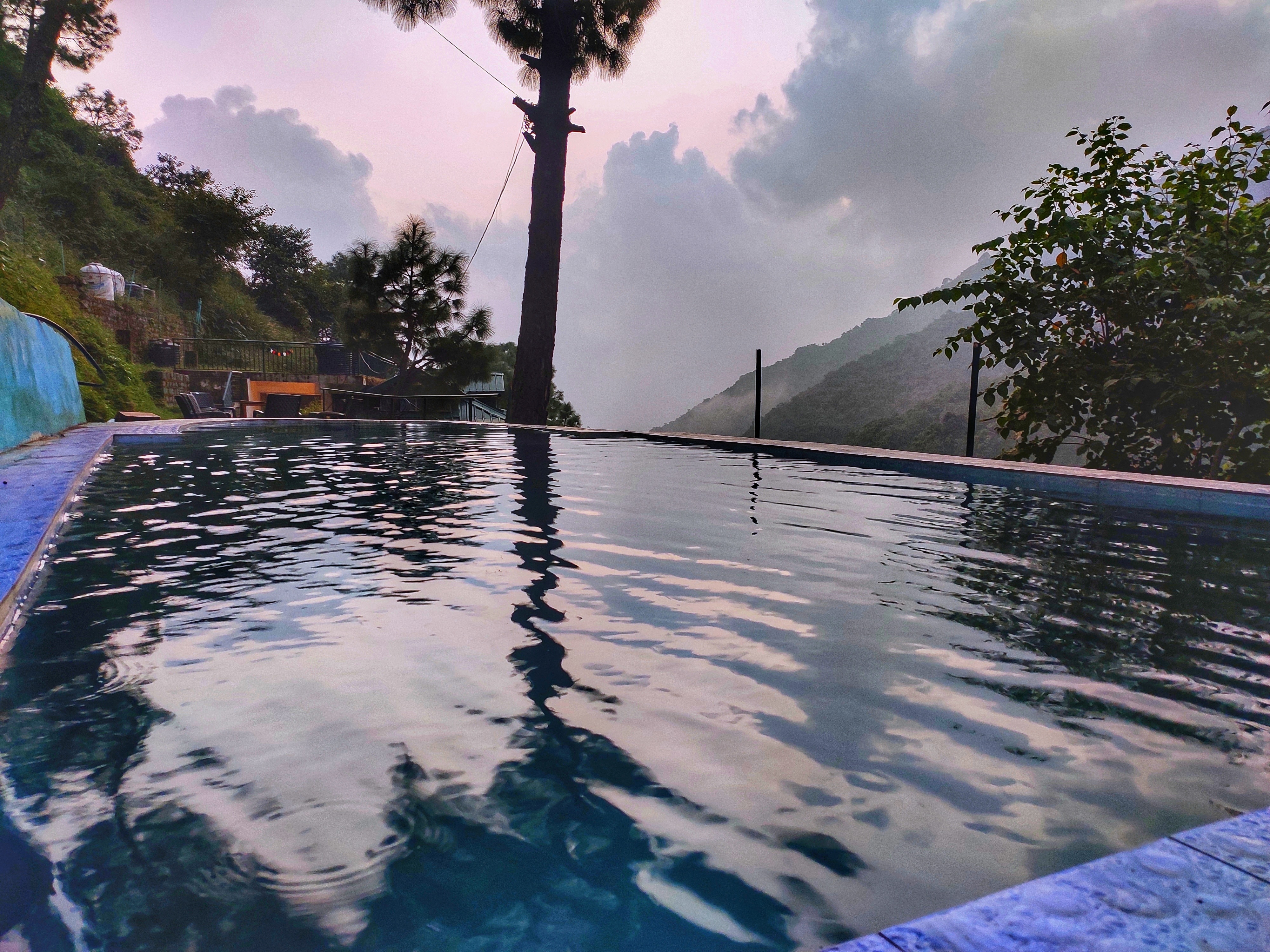 Brookside Retreat Safarmaina Resort | Rooms & Pool - Tap to explore photos