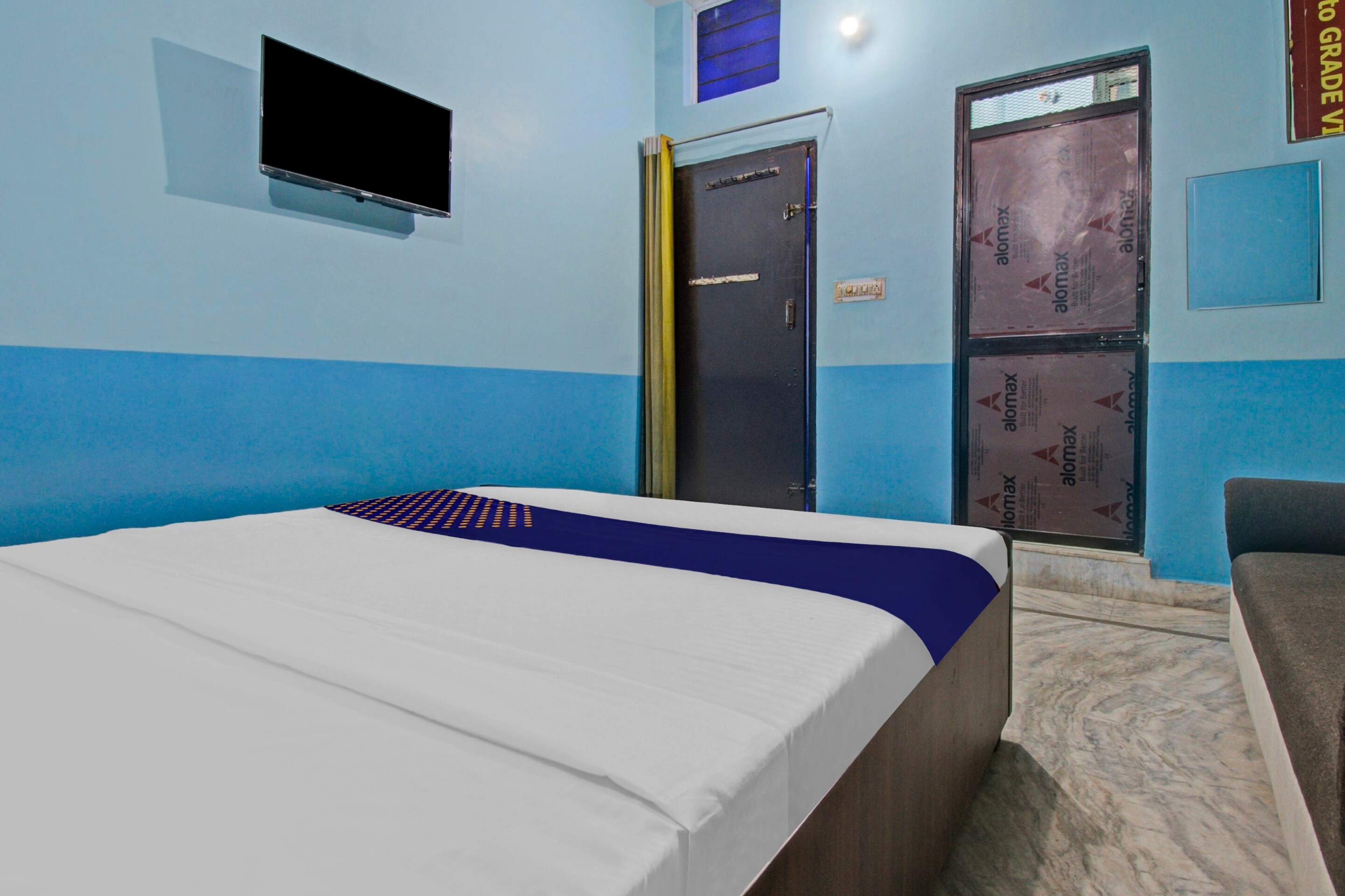 SPOT ON Hotel Rj14 - Tap to explore photos