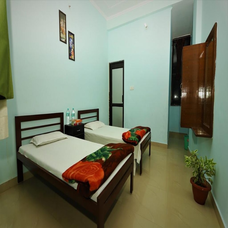 Sarika Homestay | Rooms & Caretaker - Tap to explore photos