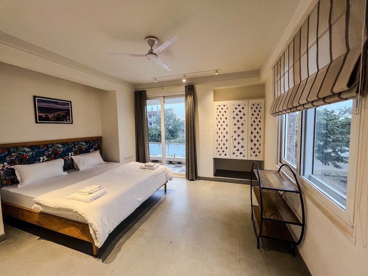 One Uptown 102 (modern 2BHK loft) - Tap to explore photos