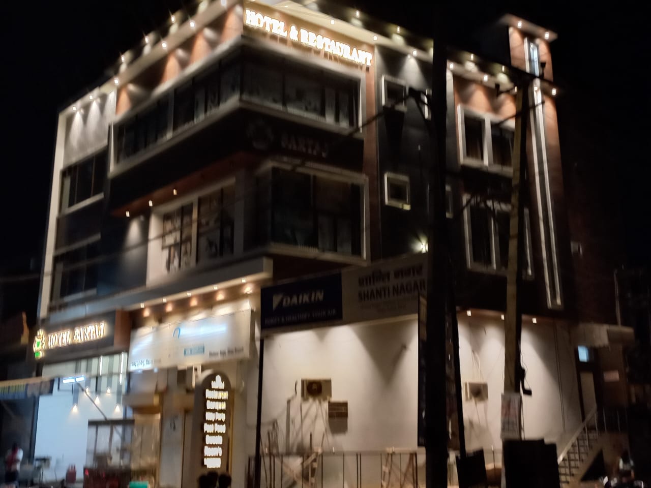 Sartaj Hotel - Tap to explore photos