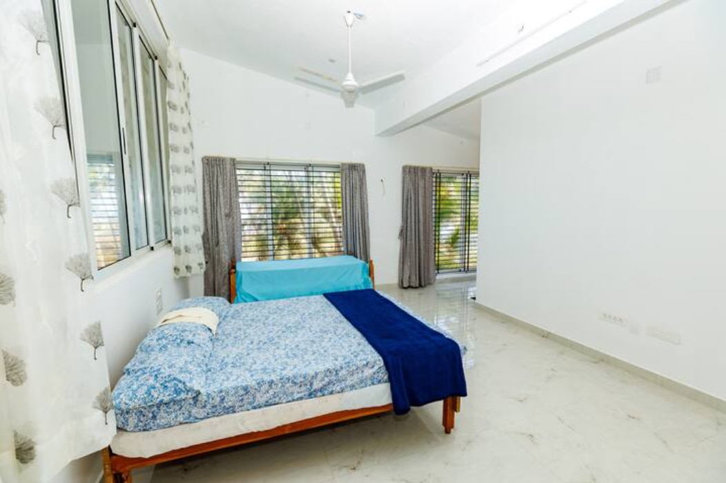Gintara Beach Homestay by evaddo - Tap to explore photos