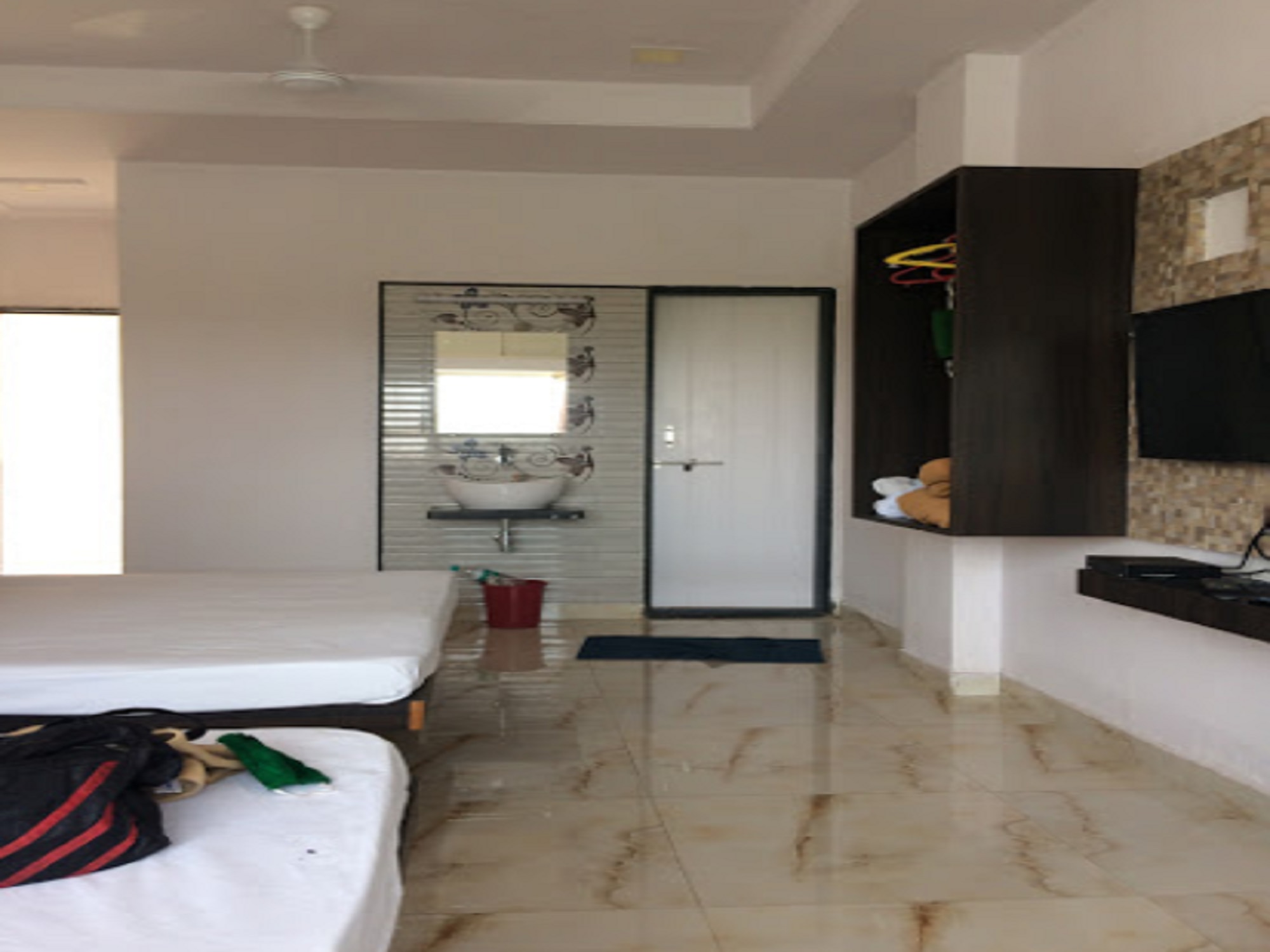 Hotel Mangalam - Tap to explore photos