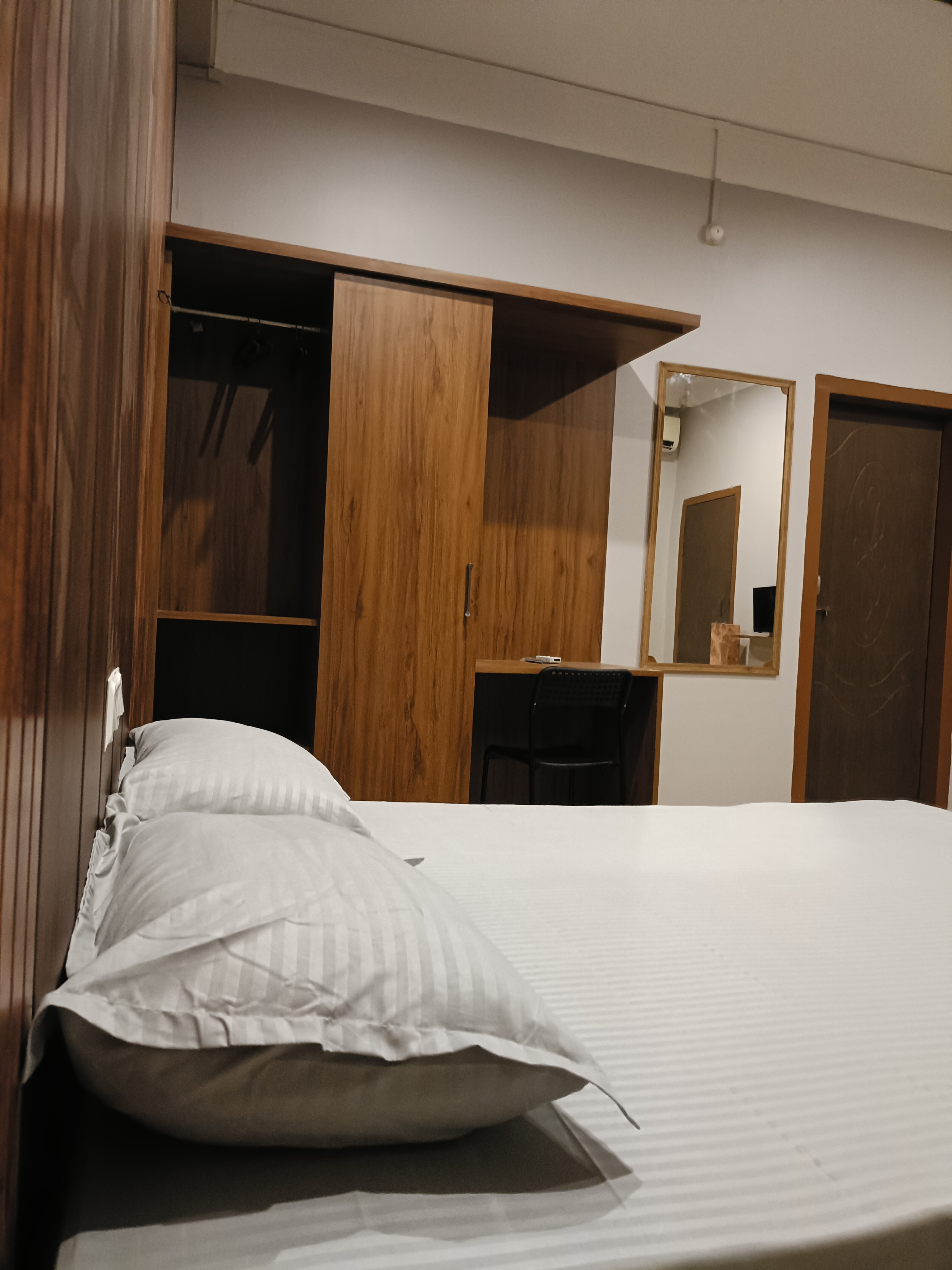 Twin Bed Room with attached Bath - Tap to explore photos