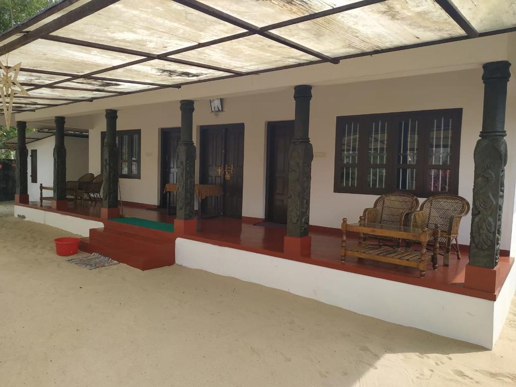 Marari Beach Homestay - Tap to explore photos