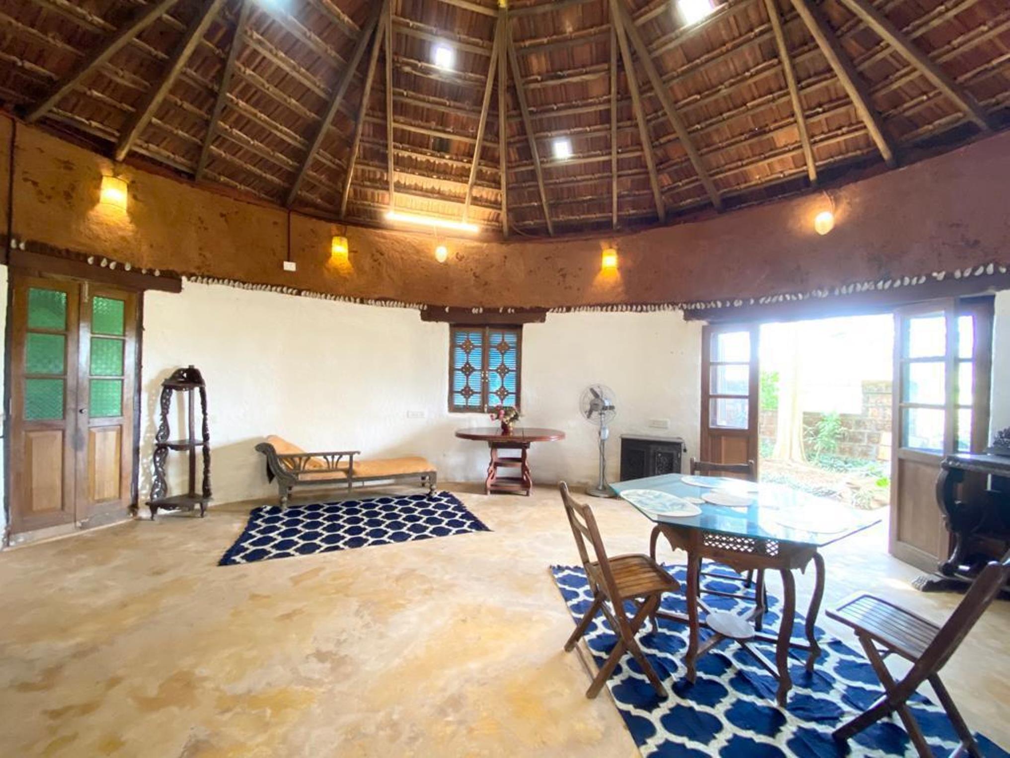 Field View 1 BHK Earth House - Tap to explore photos
