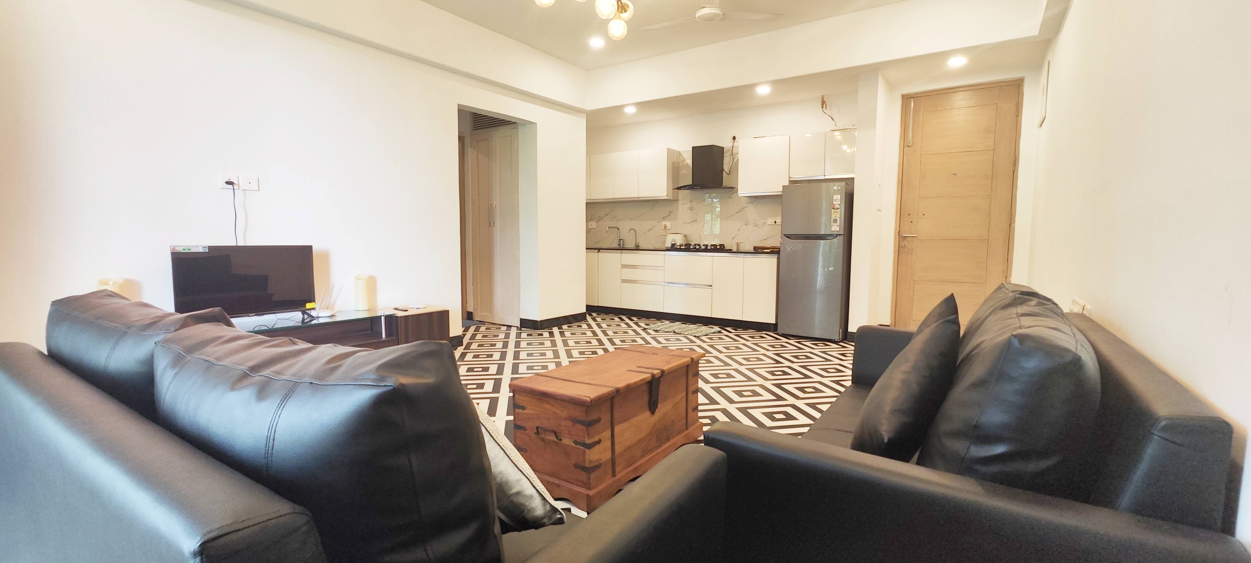 Luxury 1 bhk serviced apartment with infinity pool near Candolim beach - Tap to explore photos