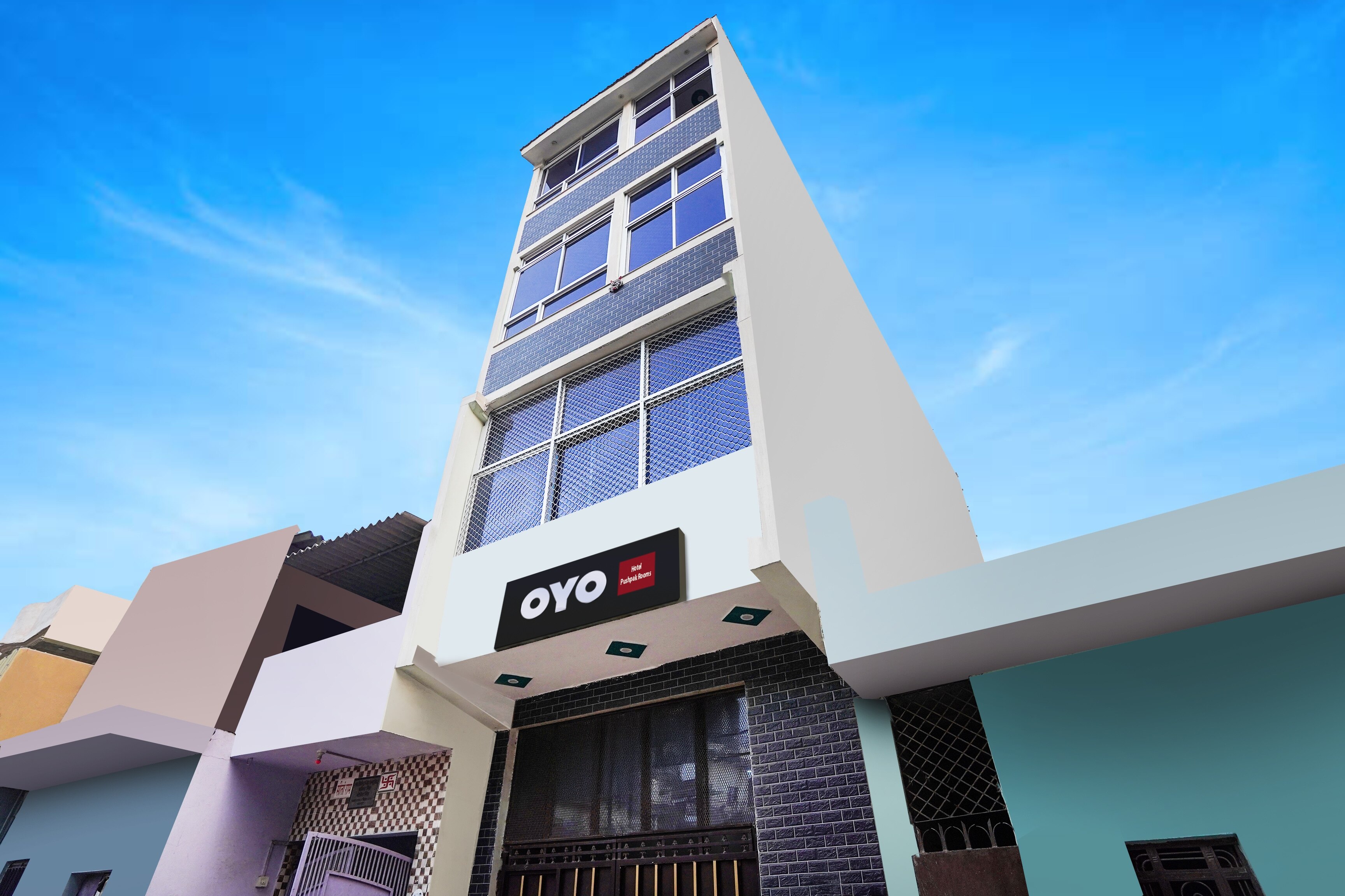 Hotel O Pushpak Rooms - Tap to explore photos