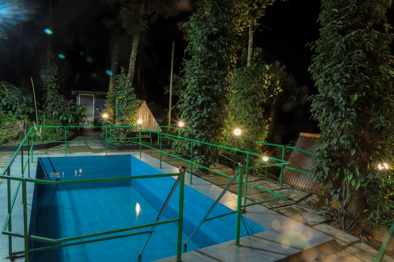 Nutmeg Plantation Cottages with pool - Tap to explore photos