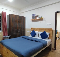 Street view 1BHK (AC in Bedroom) with Balcony