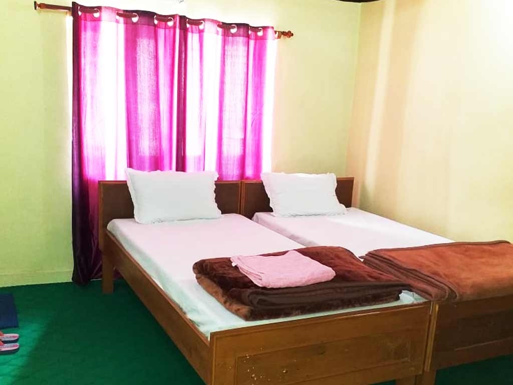 Maitreya Guest House - Tap to explore photos