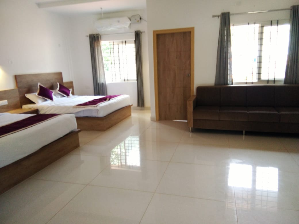 Dev's Village Resort | Rooms & Kitchen - Tap to explore photos