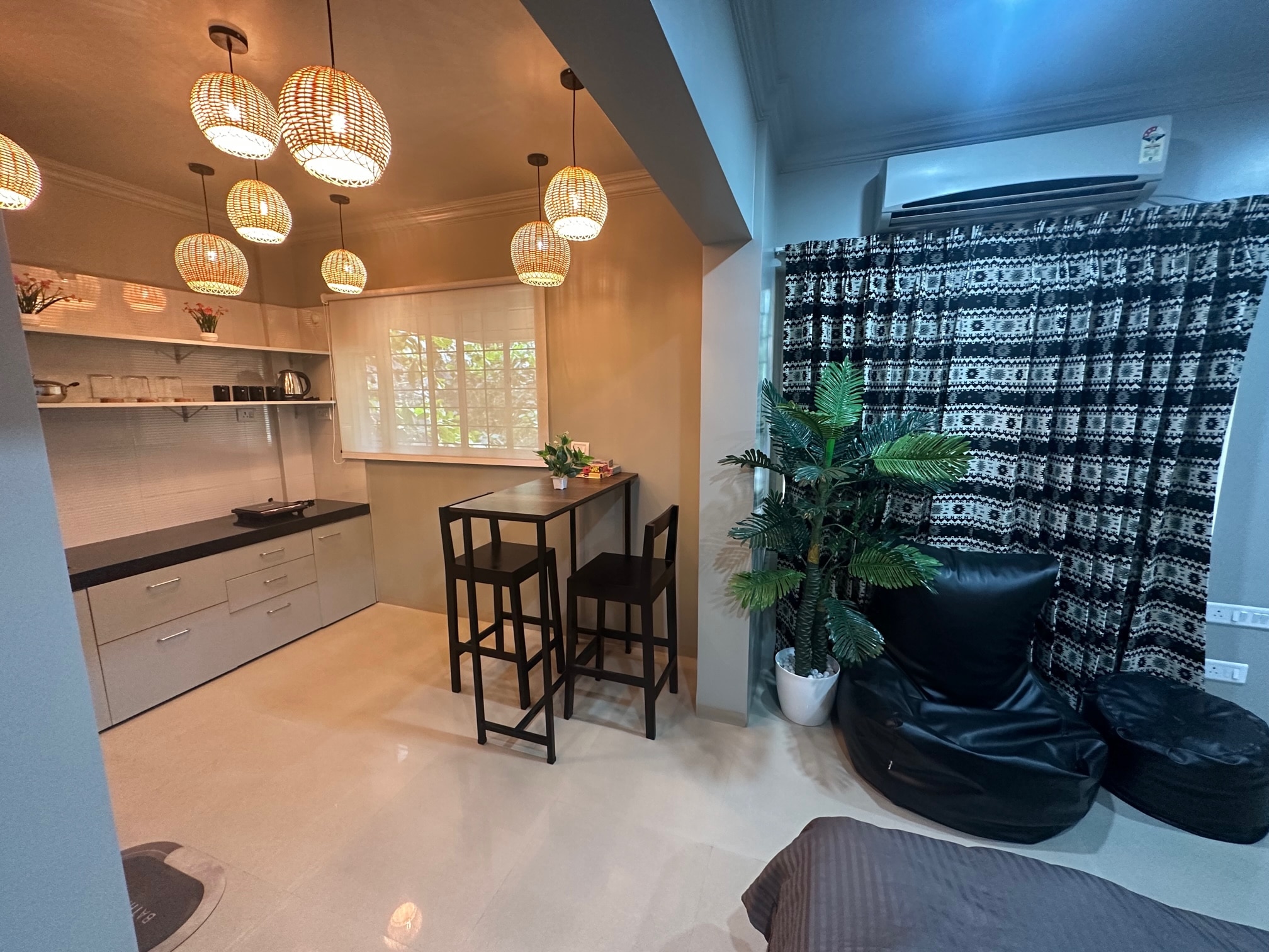 The Studio: AC, WiFi, Smart Tv, Balcony - Tap to explore photos