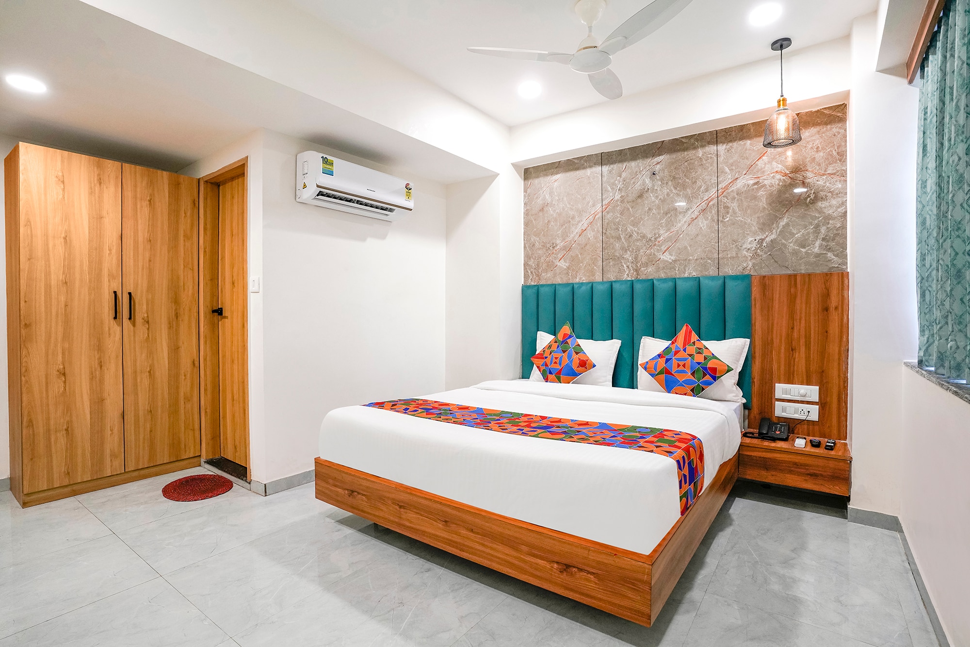 FabHotel Namantra - Nr. Apollo Circle Sardar Patel Ring Road - Tap to explore photos