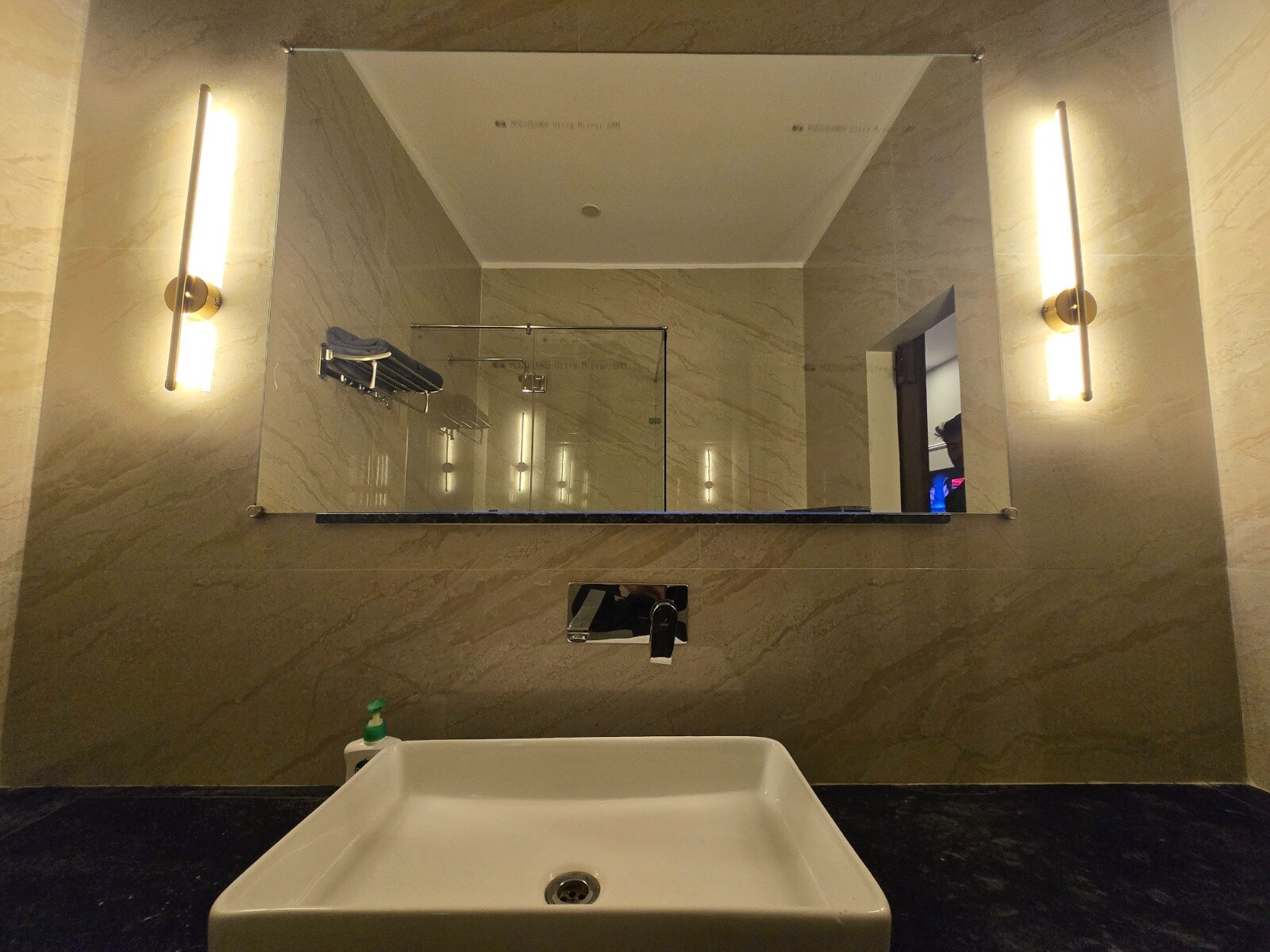 The True Host Suites - Tap to explore photos